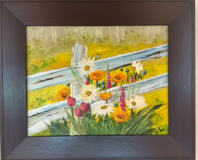 Golden field with wild flowers